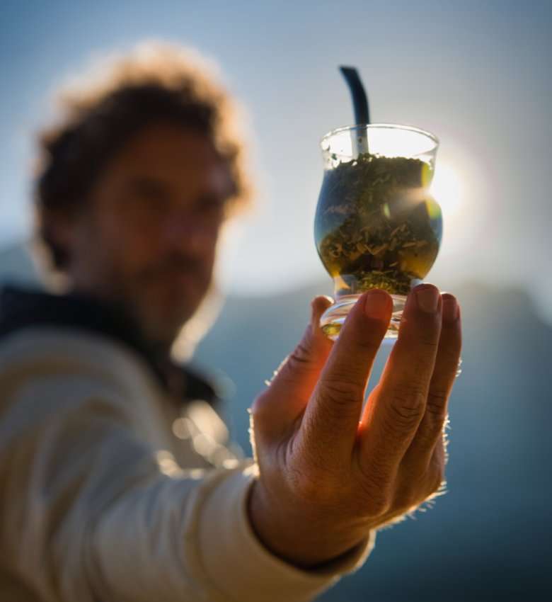 Person holding a mate